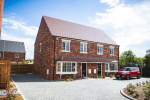 Well-maintained residential home representing property protection strategies homeowners should consider after a home inspection.