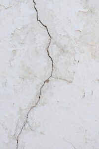 Cracked interior wall showing potential structural damage commonly identified during home inspections.